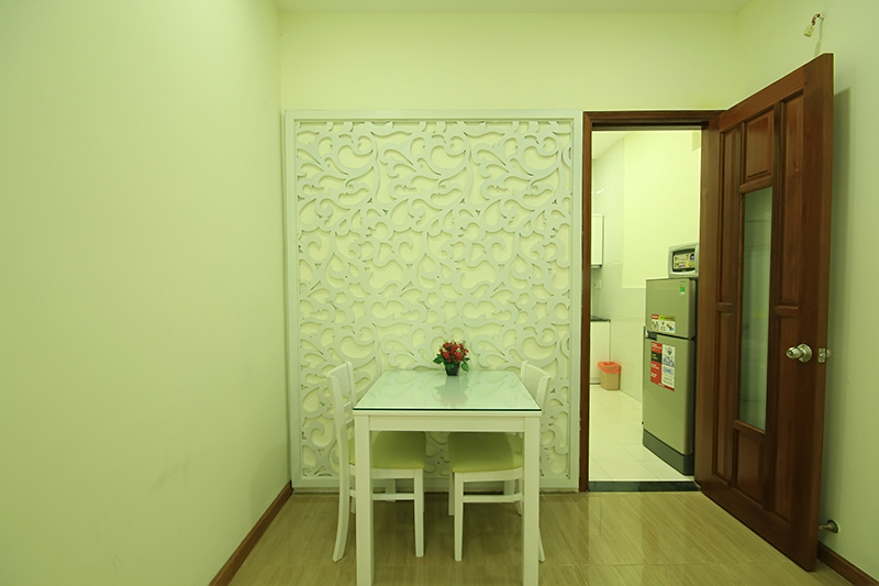 1512-0903 table at the Smiley 15 serviced apartment short term near the kitchen for 40 a day